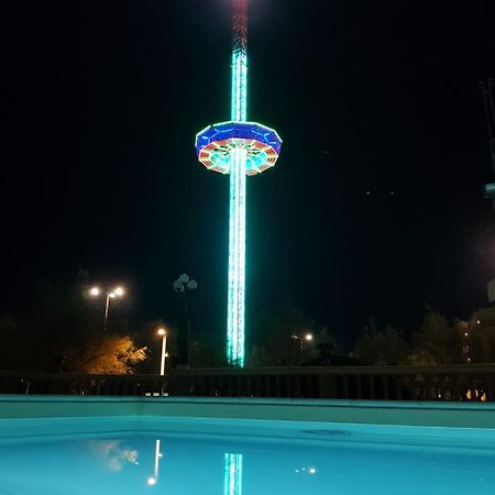 Hotel Vittoria Pesaro Exterior photo The observation tower at night