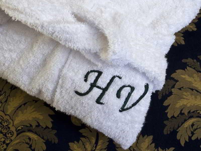 Hotel Vittoria Pesaro Exterior photo A monogram on a towel