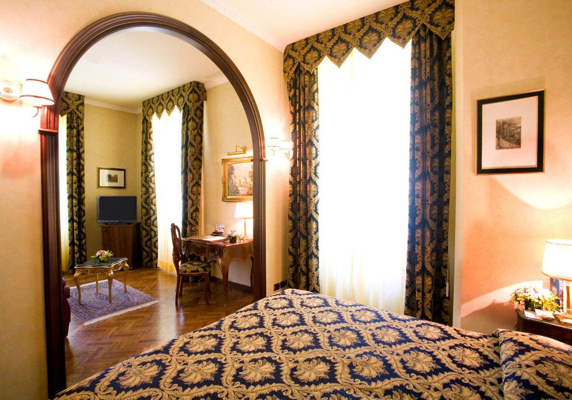 Hotel Vittoria Pesaro Room photo A suite at the Hotel